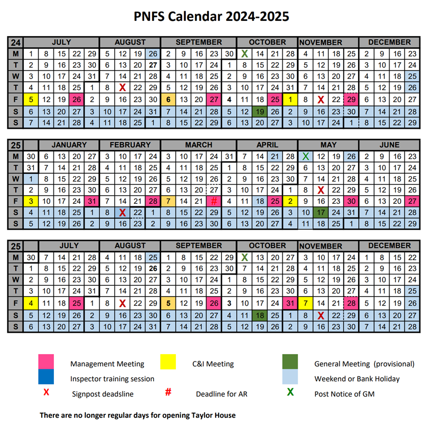 A volunteer repainting one of our cast metal signs
