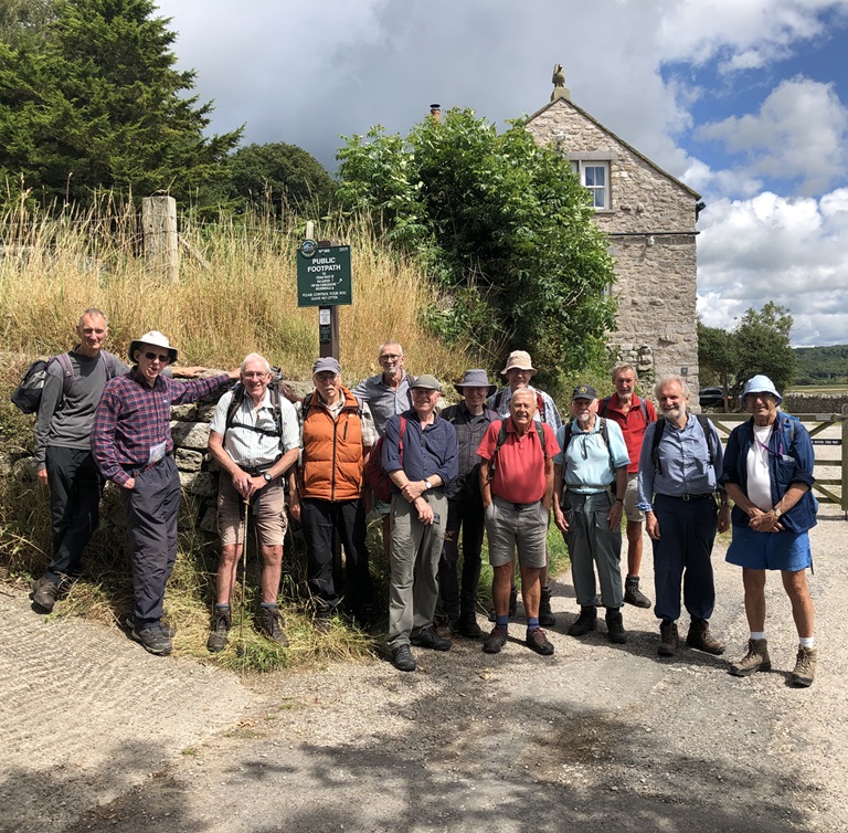 Wooden bridge over a small rocky stream